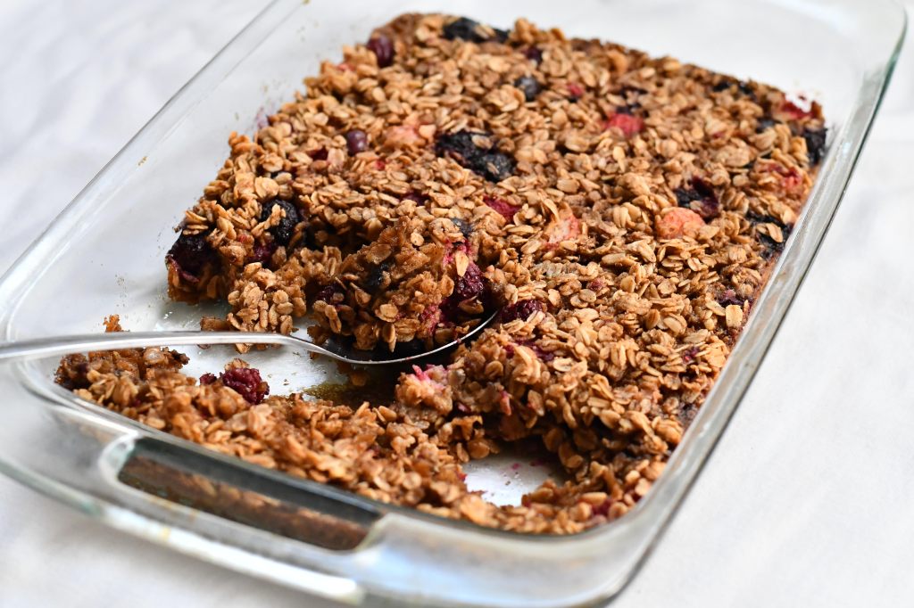 9x13 dish with mixed berry baked oatmeal